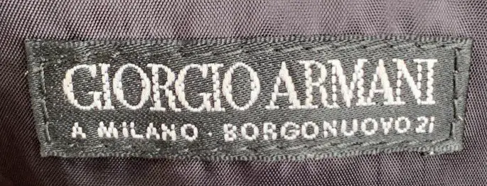 Vintage Giorgio Armani logo.