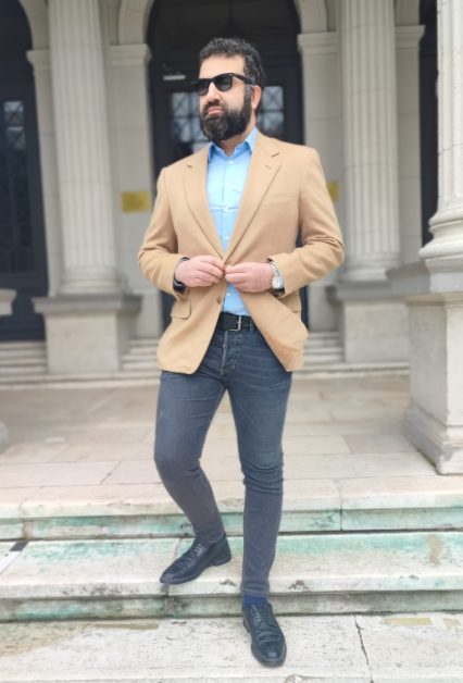 Leon Papo wearing an Ermenegildo Zegna blazer.