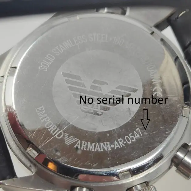 Case back of a fake Emporio Armani watch without model and ID number. 