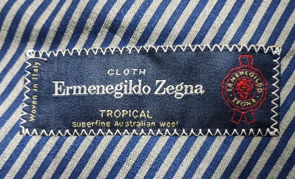 A "Cloth Ermenegildo Zegna" logo.