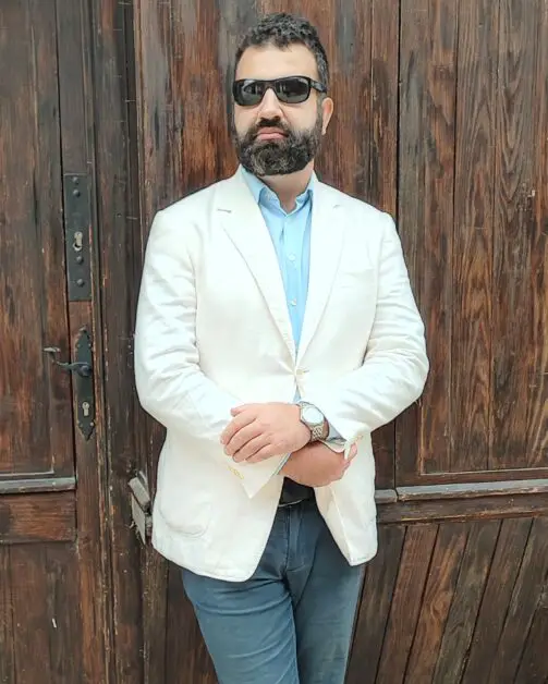 Leon Papo wearing a Canali Kei blazer